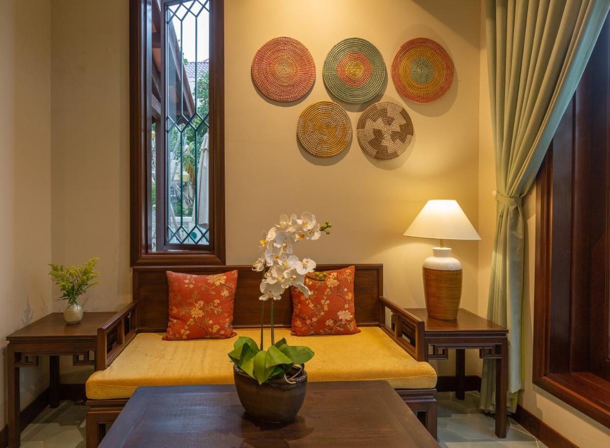 Cozy Savvy Boutique Hotel Hoi An Exteriér fotografie Interior of a suite at the hotel